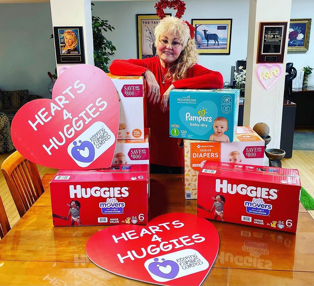 DRMC Division President Jan Leasure with donations during the Hearts for Huggies diaper drive.